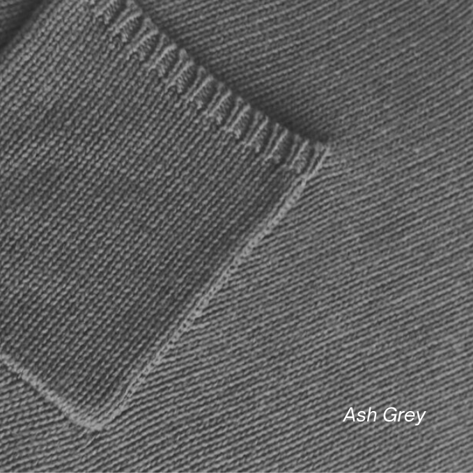 Close-up of ash gray fabric texture with 'Ash Gray' label